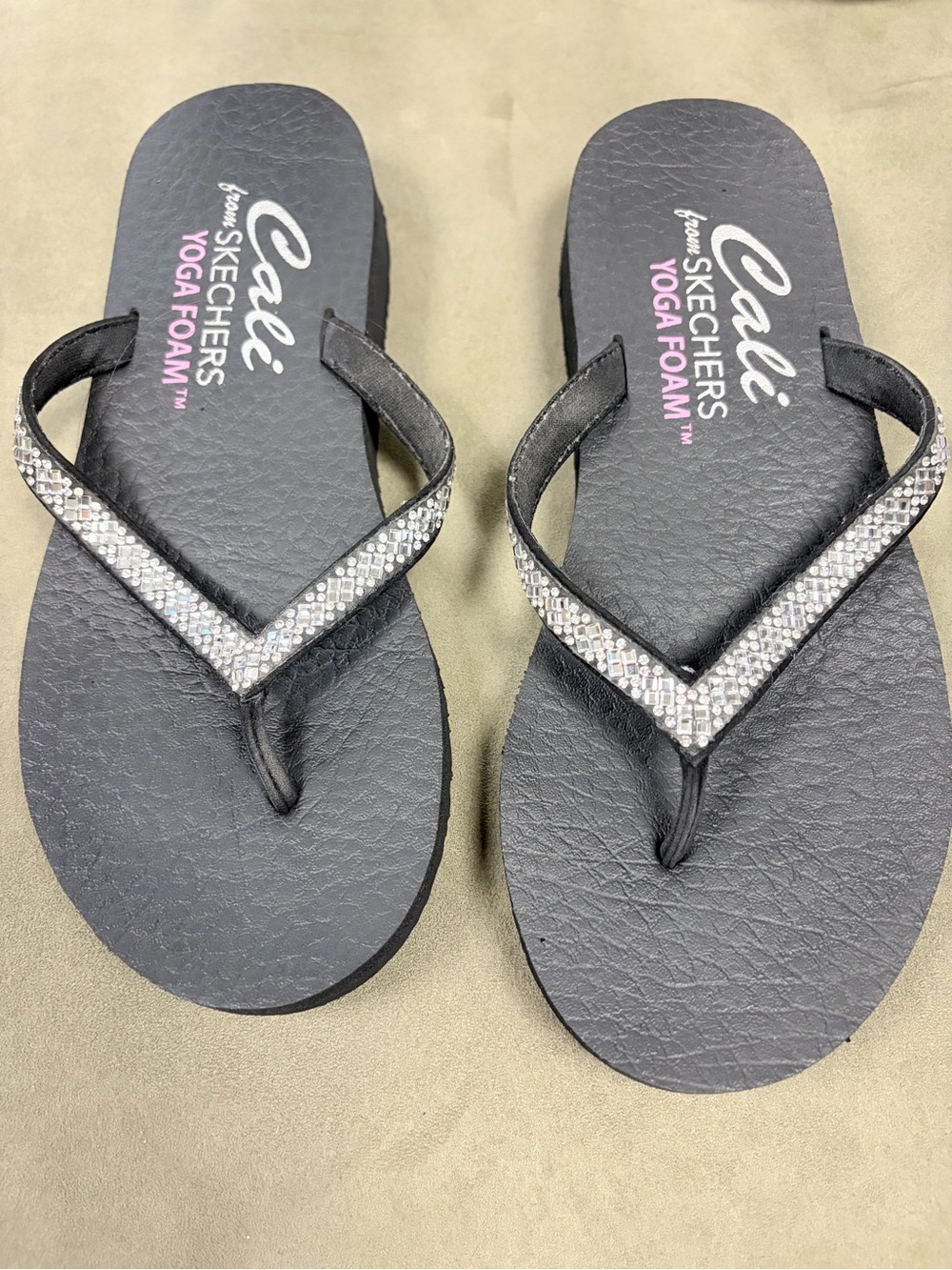 Cali from Skechers Yoga Foam Black Women's Rhinestone V-Strap Flip Flops